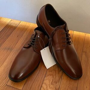 Brand new dress shoes. With tag.